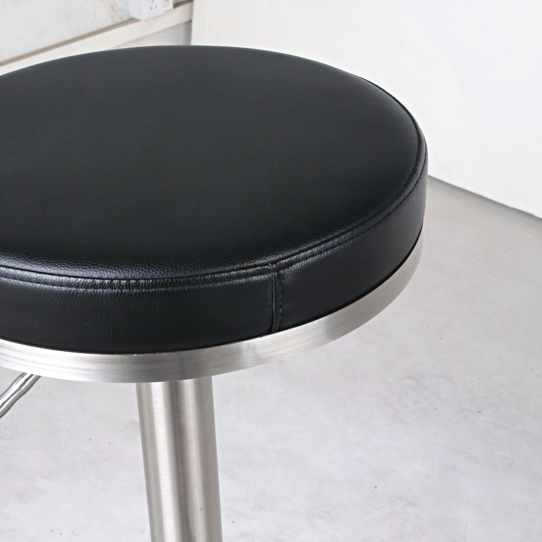 Black Round Cushion Adjustable Bar Stool with Chrome T-Bar Footrest