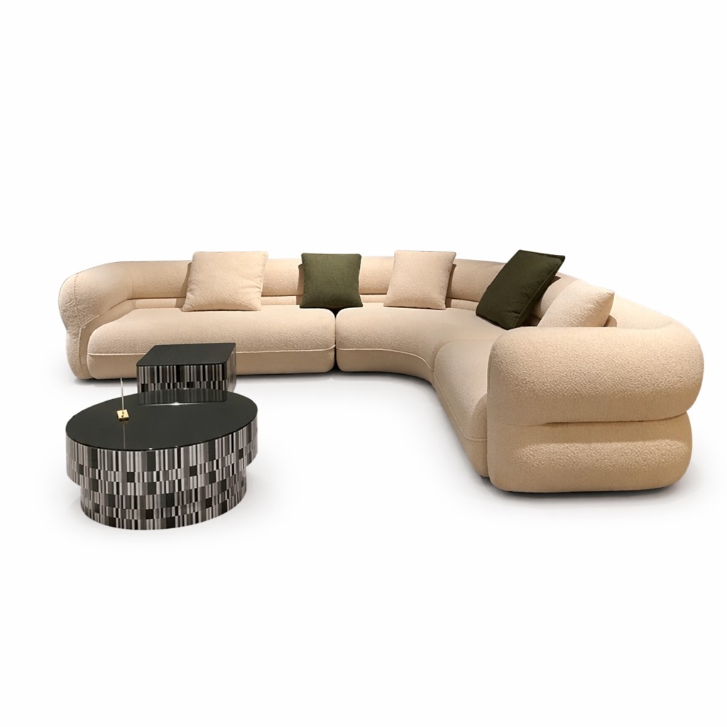 Cream Curved Sofa with Rolled Arms and Mixed Accent Pillows